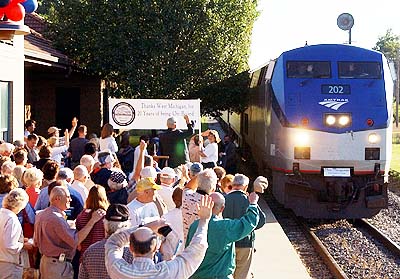The Pere Marquette arrives in Holland, Mich. Aug. 5, 2004 to celebrate the trains 20th year of service. (Photo Courtesy of Holland Sentinel / J.R. Valderas)